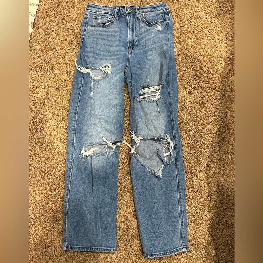 high rise light washed ripped skinny jeans